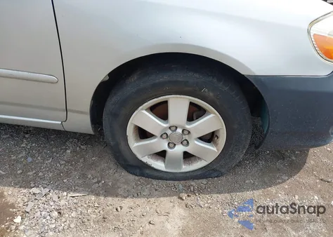 2004 Toyota Corolla Le z USA, uszkodzony, nr VIN 1NXBR38EX4Z238576